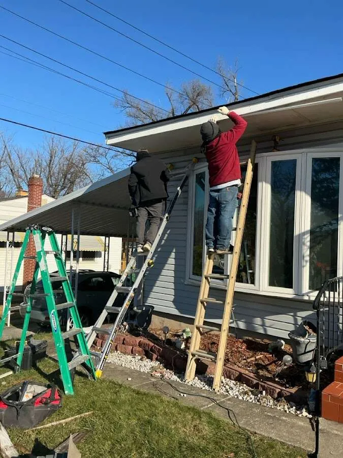 Restoration crew performing exterior repair in Frenchtown