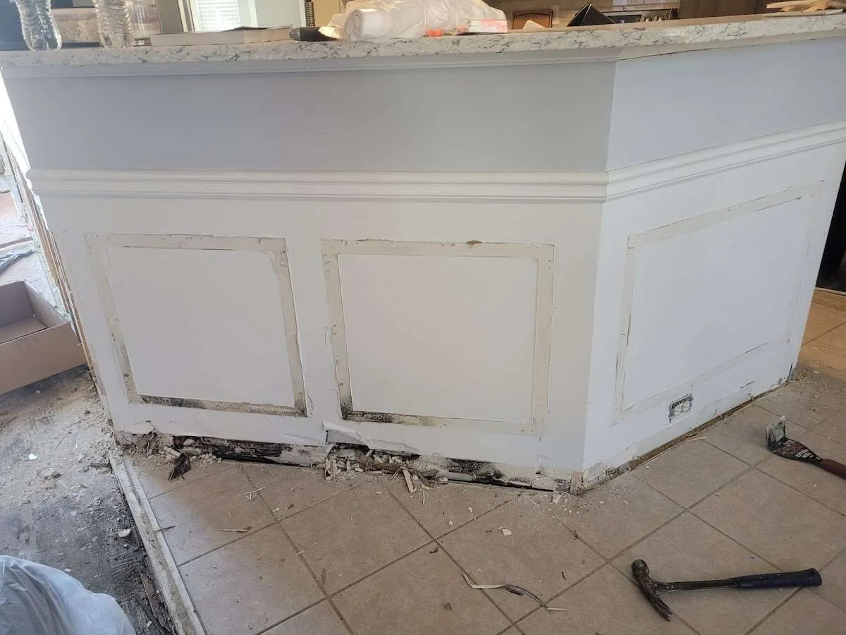Water damage and mold on kitchen during Storm Damage Restoration in Frenchtown